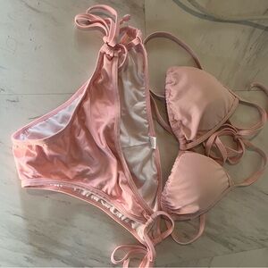 Two piece bikini. Pink size medium.